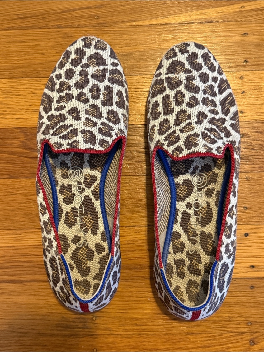 Rothy's Leopard Print Slip-On Flats with Red and Blue Trim